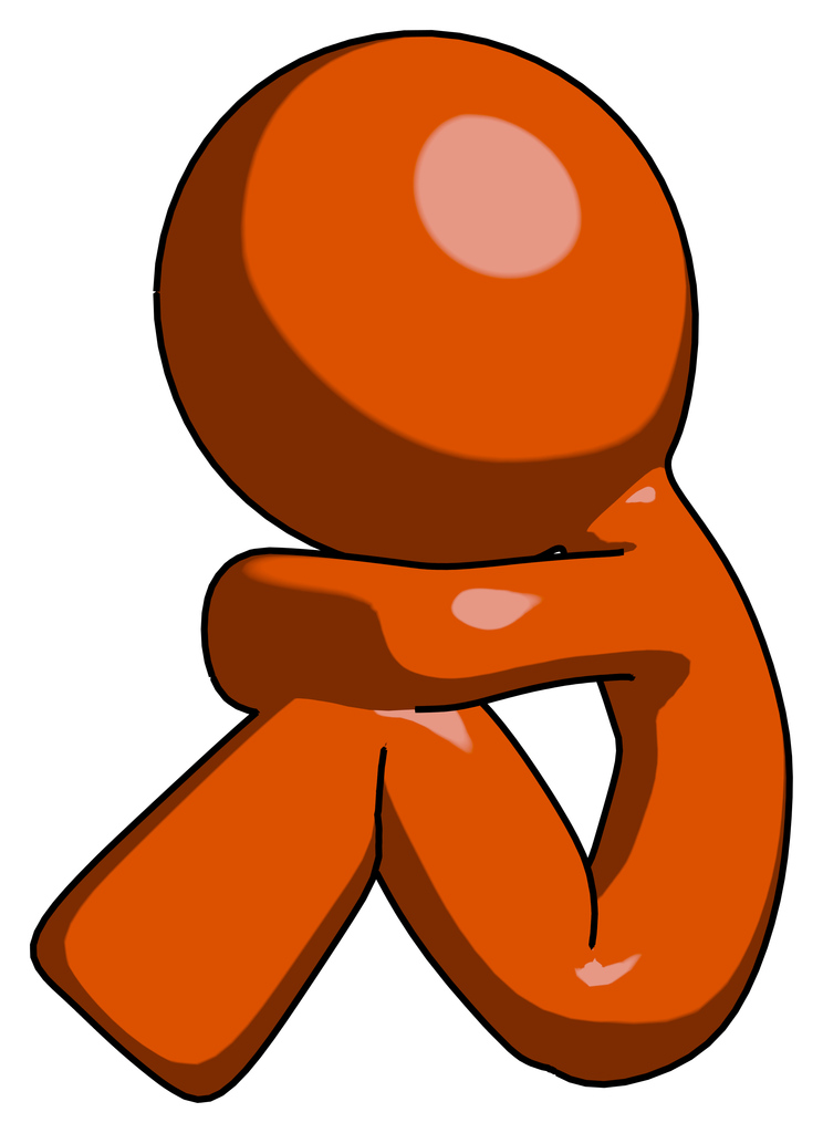 Orange Design Mascot Man Sitting with Head Down Facing Sideways Left