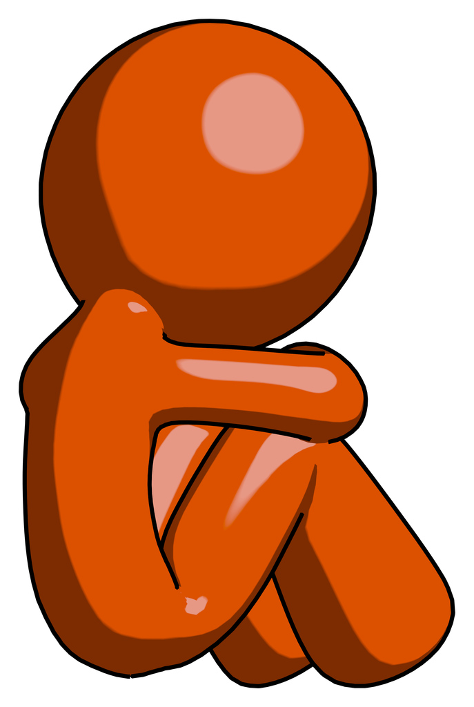 Orange Design Mascot Man Sitting with Head Down Back View Facing Right