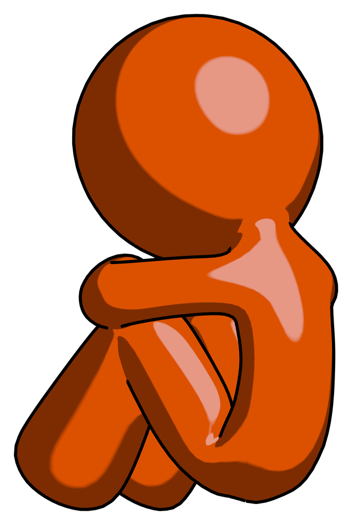 Orange Design Mascot Man Sitting with Head Down Back View Facing Left