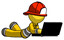 Yellow Firefighter Fireman Man using laptop computer while lying on floor side angled view