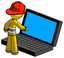 Yellow Firefighter Fireman Man using large laptop computer