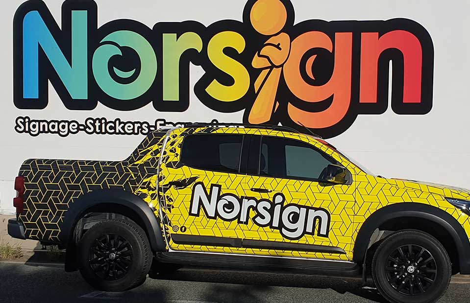Norsign company vehicle with mascot logo