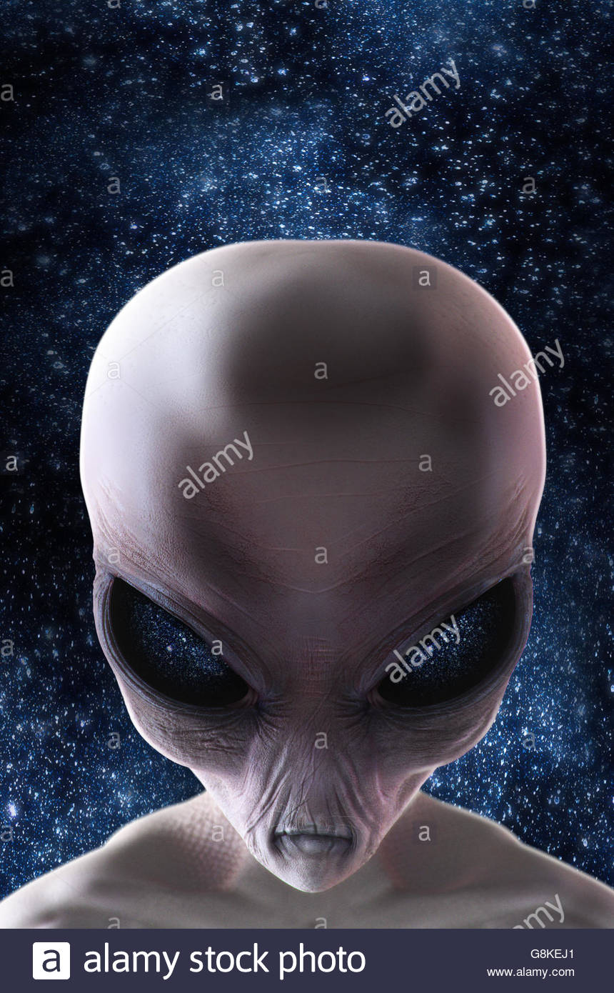 Grey alien with stars behind him, looking sinister.